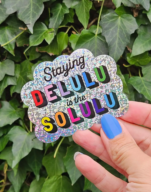 Autocollant à paillettes Staying Delulu is the Solulu